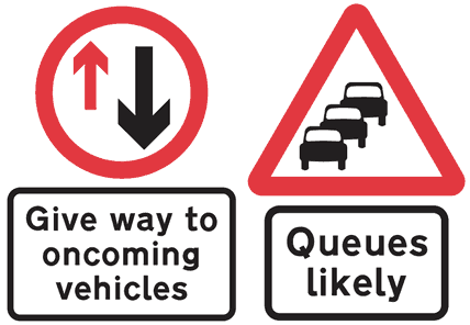 White rectangular road signs combined with other signs