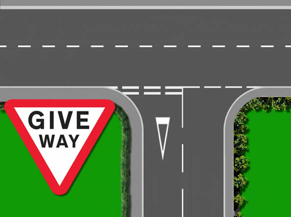 Give way T-junction road markings and sign