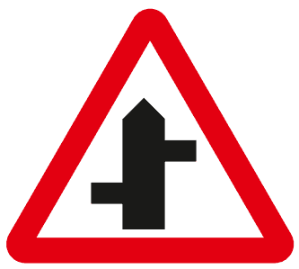 Staggered crossroads ahead road signs