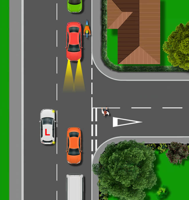 Learner driver on test, driver flashes them to let them go